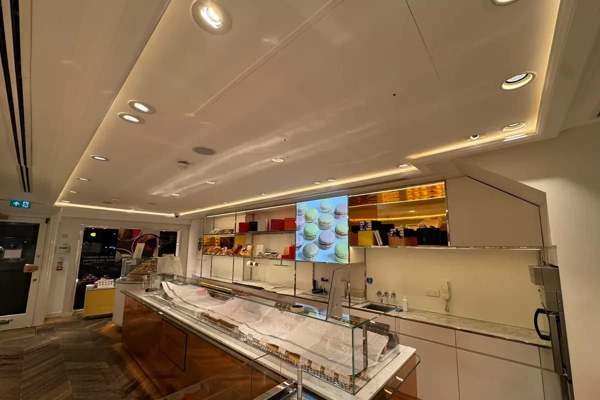 LED downlights in the ceiling of a London shop we fitted out