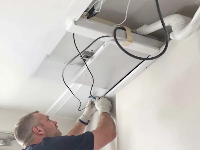 House rewiring in progress with new cables routed through ceiling void